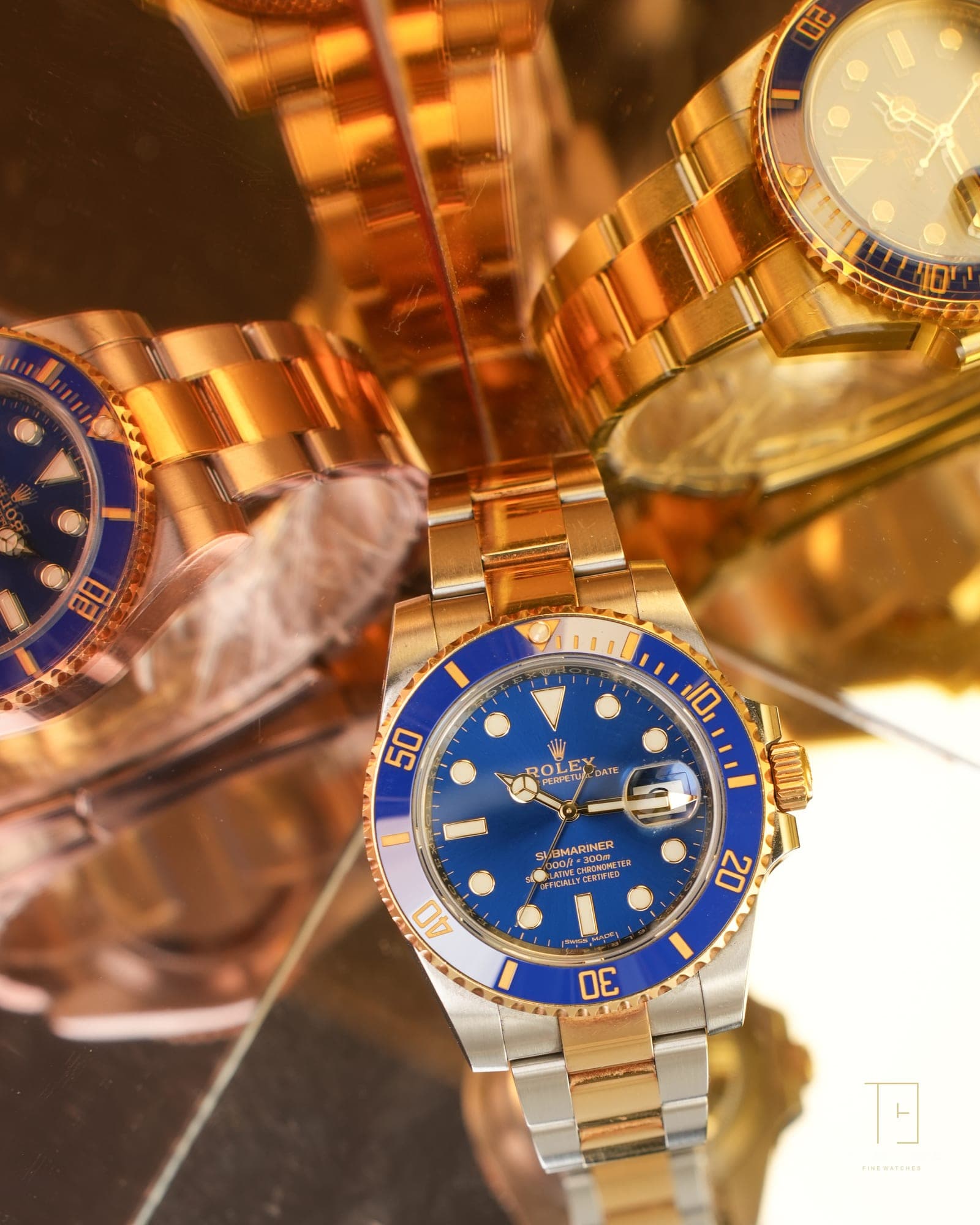A two-tone Rolex Submariner Date with blue dial and blue ceramic bezel