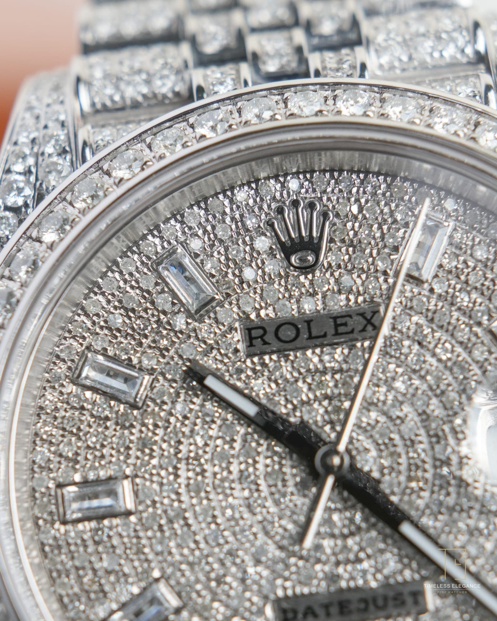 Macro detail of a Rolex Datejust with a pavé diamond dial and diamond-set bezel